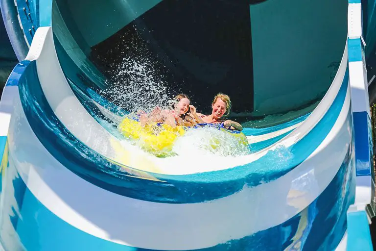 Having fun on a slider in a waterpark of Bali