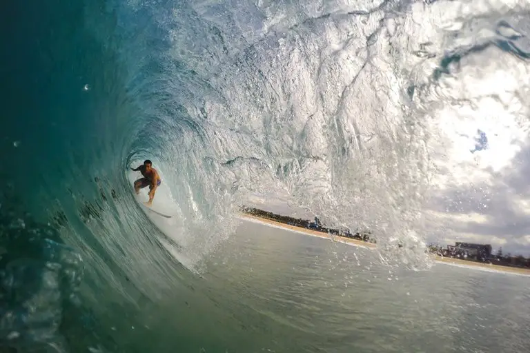 Man surfing on a beach in Bali